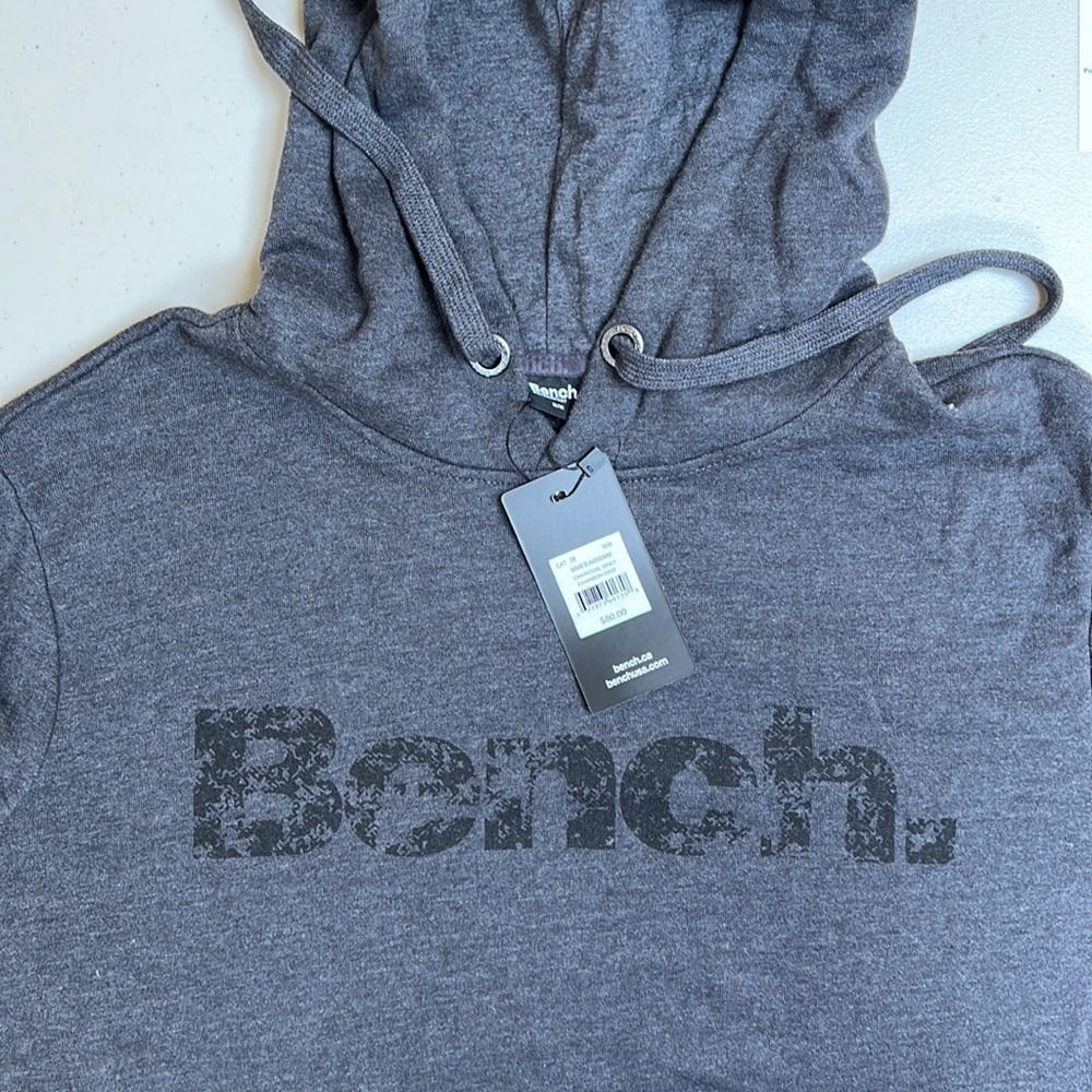 Brand-new bench medium pull over sweater with hood.